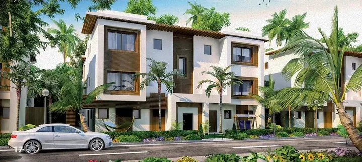 Row of homes with timber and white facades on an internal street