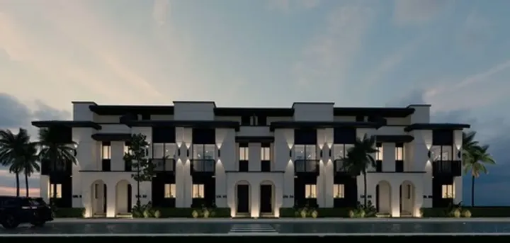 Row of townhouses at dusk at At East