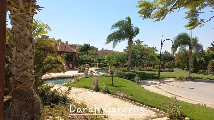 Water feature, palms and lawns in Dara Gardens