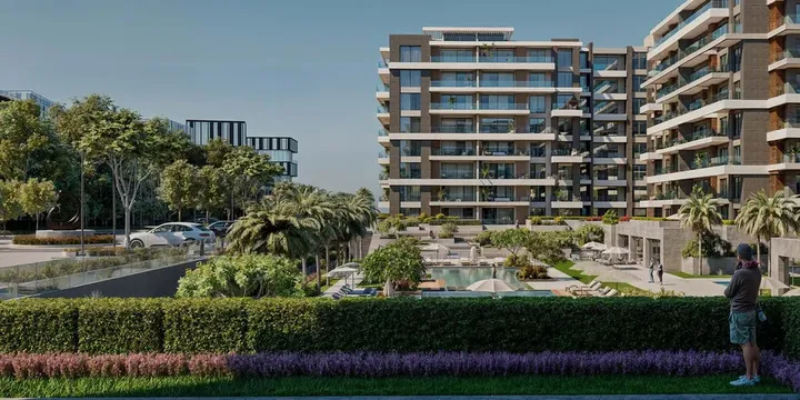 عمارات سكنية حديثة خلف سياج أخضر في الباتيو فيدا