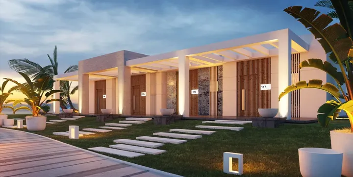 Row of ground-floor chalets with white and timber facades at Gaia