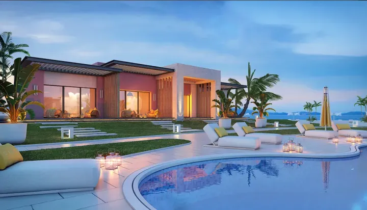Ground-floor chalets facing a pool at sunset