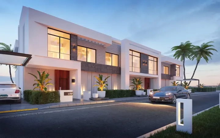 Row of white townhouses on an internal street
