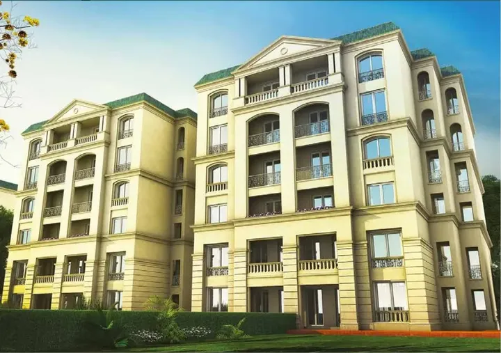 Residential building facade with tall windows in L'Avenir