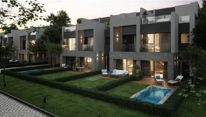 Back garden with outdoor seating and a pool in Rare
