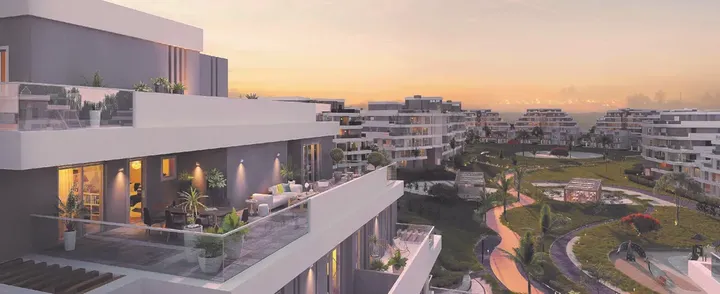 تراس شقة يطل على حدائق سكاي كوندوز عند الغروب