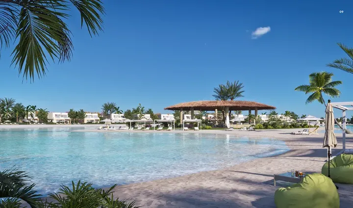 Sandy lagoon and beach shelter at Summer