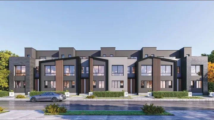 Townhouse facades along an internal street at The Ridge