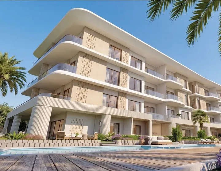 Chalet block with wide balconies and a pool at Youd